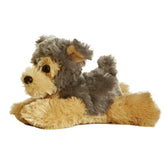 A Yorkshire terrier plush from Mini Flopsie by Aurora with two-tone fur and an irresistibly sweet face.